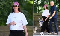 Anne Hathaway, 43, looks ready to pop as she steps out in New York... after trolls accused her of FAKING pregnancy