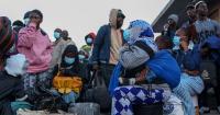 Durban refugees face uncertain future amid move from pavement to park, Lindela