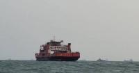 Oil tanker towed toward Omani port after being hit in Strait of Hormuz