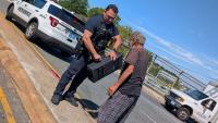 Providence police officer helps homeless man with gift of saxophone after his was ruined