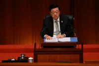 World AFP Hong Kong unveils plan to align economy with China's goals