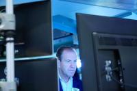 Stocks slip as oil prices, bond market add pressure