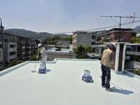 Heat-reflective 'cool roof' paint cuts summer power bills for vulnerable Seoul households