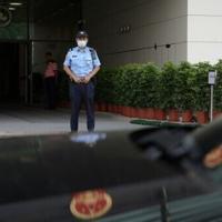 Macau holds first closed-door national security trial