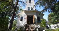 A 100-year-old former church building in Pittsfield is back on the market after a stint as a residence