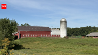 Don Butler moved to his family's New York farm at 7, when its 1887 barn was still the primary barn; decades later, 75 acres are permanently protected amid weekly solar-farm solicitations