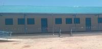 IOM hands over new health, education facilities to Leer community