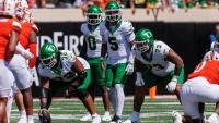 Oklahoma State coach says Oregon QB Dante Moore was 'tipping' hand