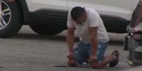 Man drops to his knees after hearing of Los Angeles news helicopter crash