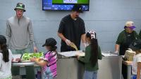 Milwaukee Bucks serve lunch for Lincoln Avenue kids after school fire