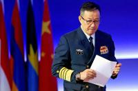 Chinese minister urges vigilance