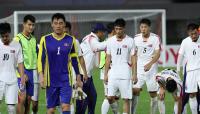 North Korea blows lead in loss to China in men's football