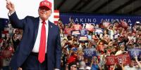 Trump stunned as protester disrupts North Carolina rally: 'She's going home to mama'