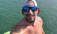 Energy executive, 48, vanishes while paddleboarding off Florida beach as coast guard launch desperate search