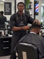 Nigerian barber, 22, turns clippers, scissors into tool for community empowerment