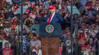 Trump unleashes bizarre rant at protestor telling her to 'go home to mama' at North Carolina rally