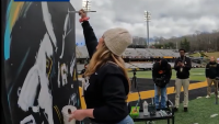 North Carolina native trades traditional studio art for high-energy live speed painting