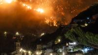 Vacation paradise under attack as officials suspect arsonists may be behind inferno