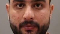 Afghan national who pinned down and raped two girls, 14, in flat after plying them with alcohol is jailed