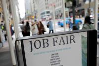 U.S. jobless claims fall unexpectedly, labor market remains steady
