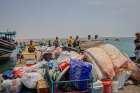 Saudis and Houthis trade strikes as Yemenis take to boats to flee fighting as war spreads