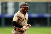 Padres rout Rockies, add to lead in playoff race