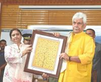 Bridge science-policy gap to fight climate change: LG Sinha