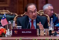 Malaysia offers to host Min Aung Hlaing over refugee deal; American deported from Myanmar after months in jail