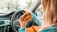 Lawyer explains whether it is legal to eat food and drink water while driving