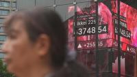 Yen weakens after Bank of Japan hikes rates as expected