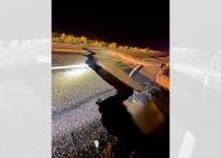 Deadly flooding washes out roads, forces evacuations