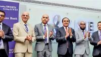 Amana Bank commemorates 15-year milestone by ringing market opening bell
