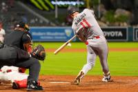 Twins rally late with Jenkins HR, but lose to Angels 5-4 in 10