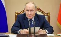 Russians begin voting in staged election Putin is guaranteed to win - with parties that support his war the only ones allowed to enter
