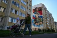 Russians begin voting in controlled election as war drags on