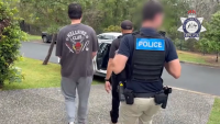 Queensland teenager arrested after FBI tip-off into extremist social channels