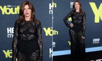 Sharon Horgan, 56, turns up the heat in a daring sheer black lace dress as she poses at the New York premiere of major HBO new series Youth
