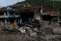 In a Nepal town, flood survivors find little trace of former lives