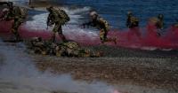 Close-up view for tourists as military drills held on Crete beach