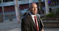 Facing 10 years in prison, ex-budget official flees U.S. by boat and plane