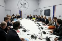 Macron briefs party leaders on lasting foreign crises as Le Pen snubs session