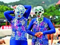 Saving face, from the sun: China's facekini boom isn't just about fair skin