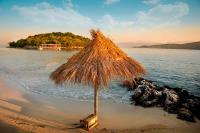 This Tiny Beach Town Is Called the ‘Caribbean of Europe’ With the Bluest Water in the World—and Summer Weather Lingers Well Into Fall