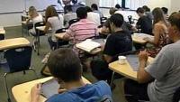 Mississippi Christian University students take notes by hand