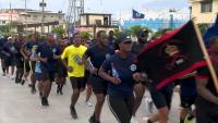 Belize’s Security Forces Carry Flame of Freedom in Inaugural Run