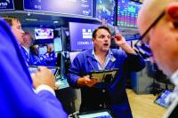 Stocks, bonds dip as central banks hike rates to curb inflation