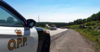 OPP stop Quebec driver with revoked licence watching video on phone at 145 km/h