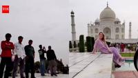 Photographer confronts crowd surrounding foreign female tourist at Taj Mahal; video sparks debate on "Civic Sense"