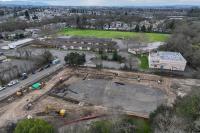 A controversial Windsor housing project just shrank by a third, but neighbors are still pushing back