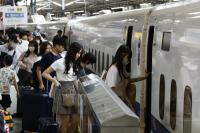 Travelers crowd airports, stations at start of Japan's Silver Week holidays